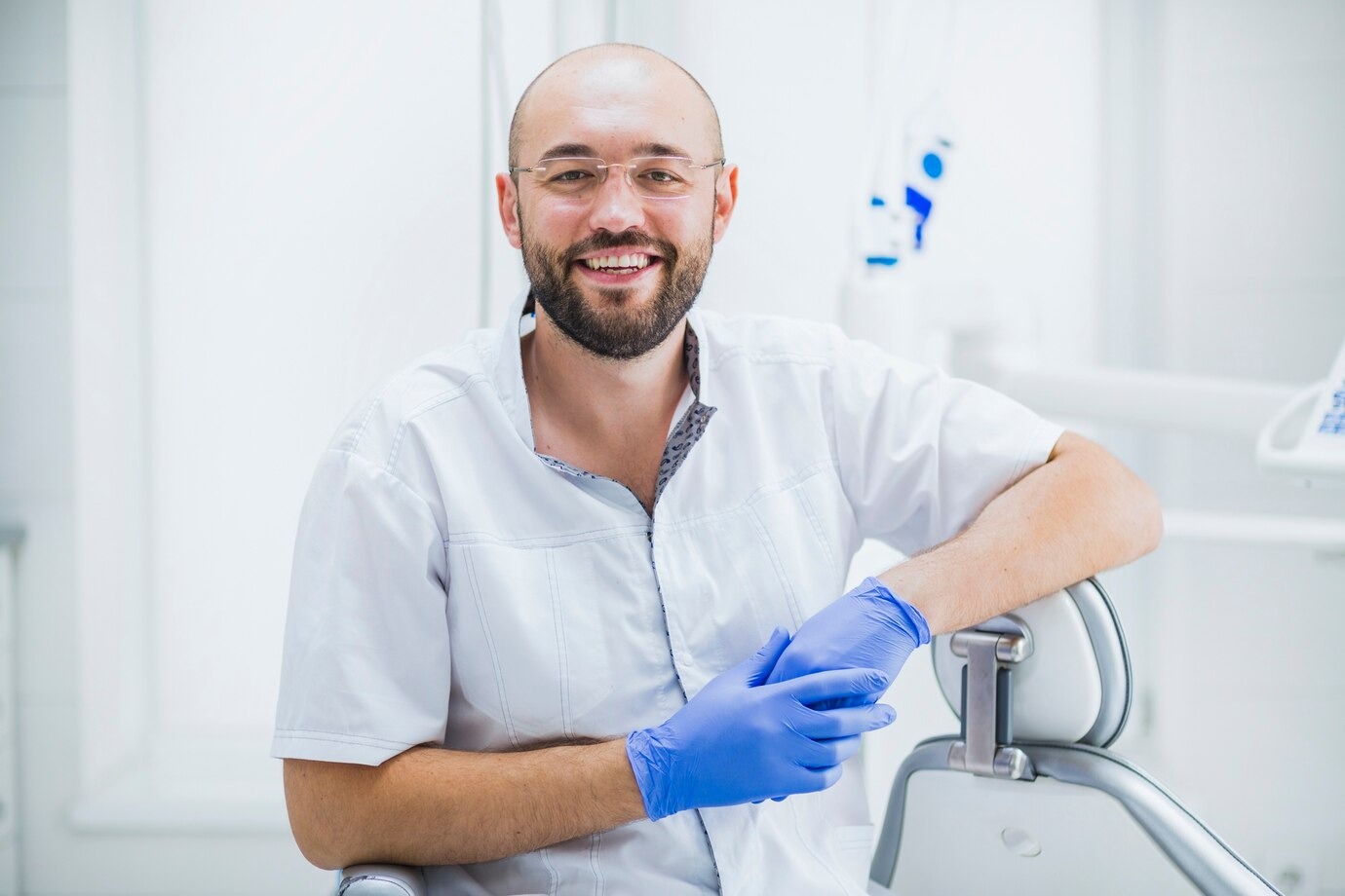 A clinician smiling with a patient